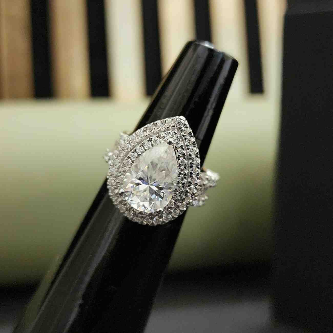 Elegant Pear Shaped Lab Grown Halo Pave Diamond Ring